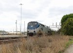 AMTK 147 leads train P080-25 past the signals at DI
